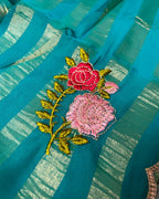 Sky Blue Colour Floral Golden Zari Border Saree