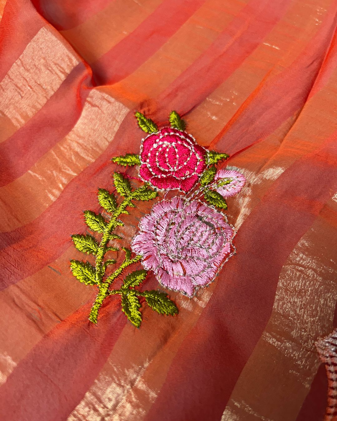 Rust Orange Colour Floral Golden Zari Border Saree