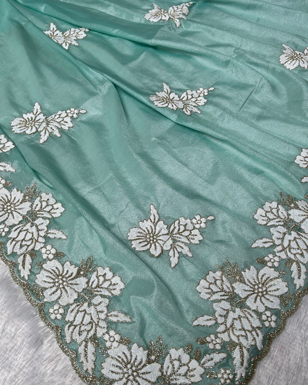 Mint Green Colour Shimmer Saree with Heavy Floral Embroidery Border