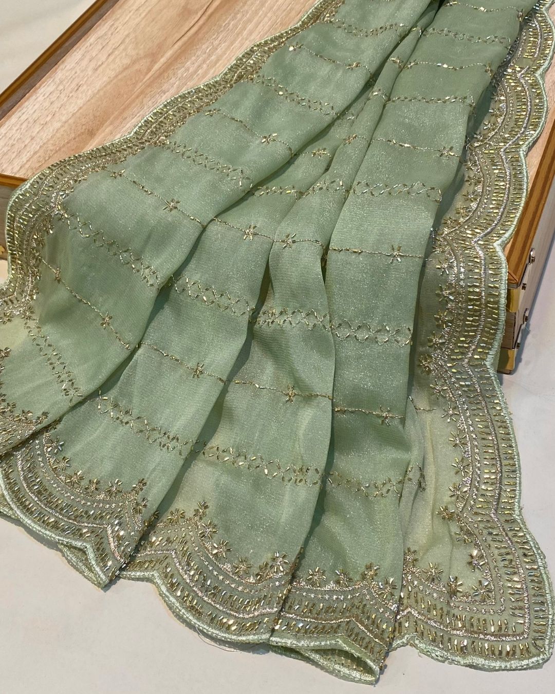 Dusty Olive Green Colour Shimmer Georgette Saree with Bead Work